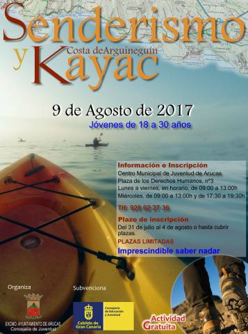 Cartel de senderismo y kayac en Arguineguín